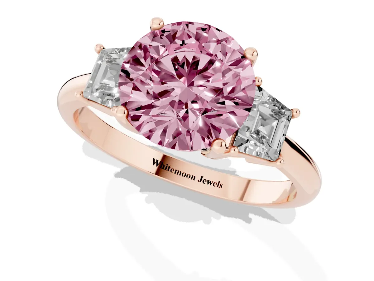 Fancy Pink Round Cut Diamond Three-Stone Ring with Trapezoid Side Stones and Prong Setting Rose gold