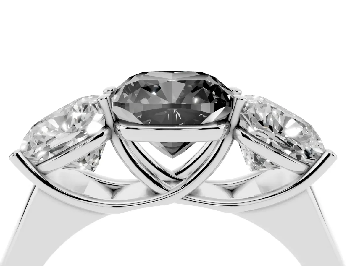 Fancy Black Cushion Cut Three-Stone Diamond Ring with Prong Setting on a Classic Band Platinum
