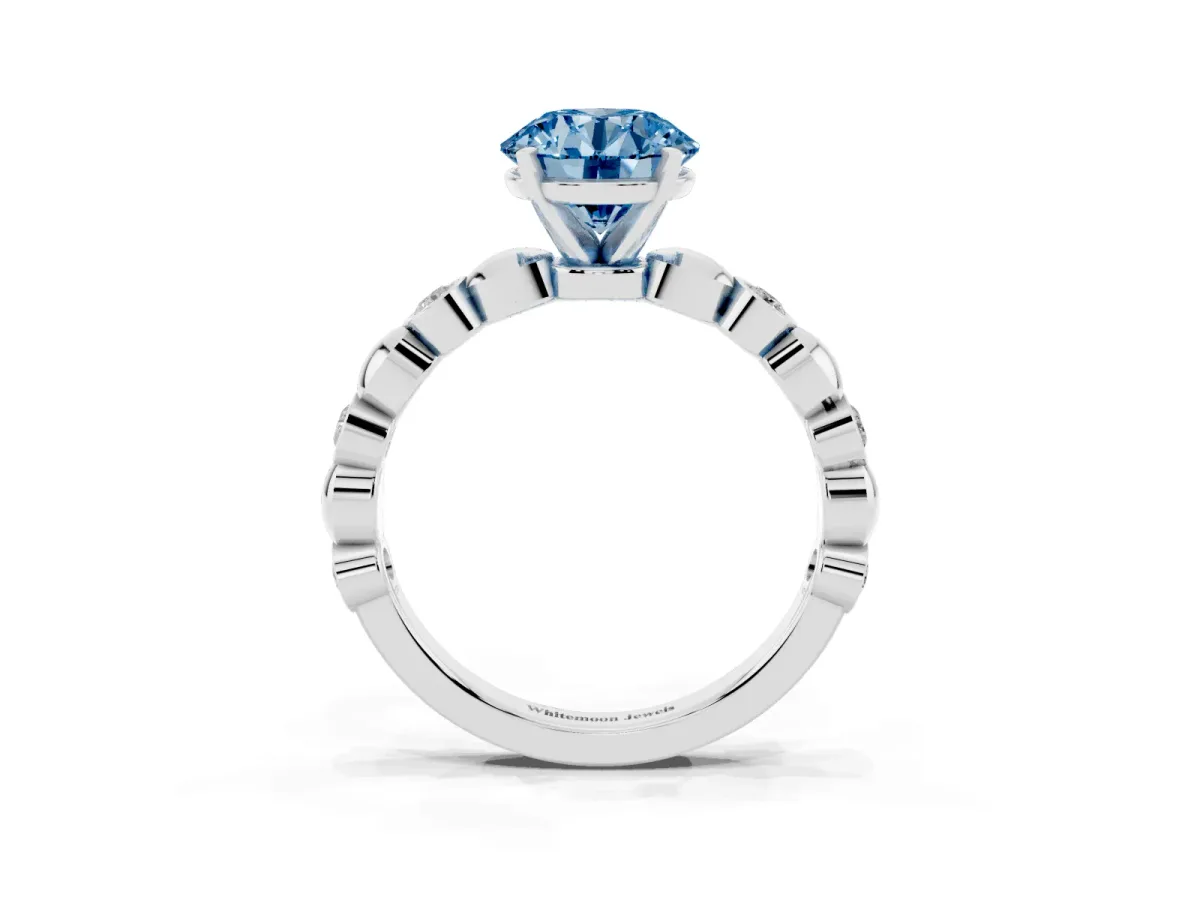 Fancy Blue Round Cut Solitaire Bezel-Set Diamond Ring with Beaded Band and Four-Prong Setting Silver