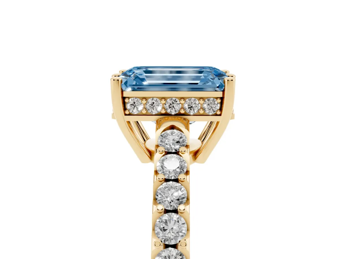 Fancy Blue Emerald Cut Solitaire Diamond Engagement Ring with Pavé Band and Six-Prong Setting Yellow gold