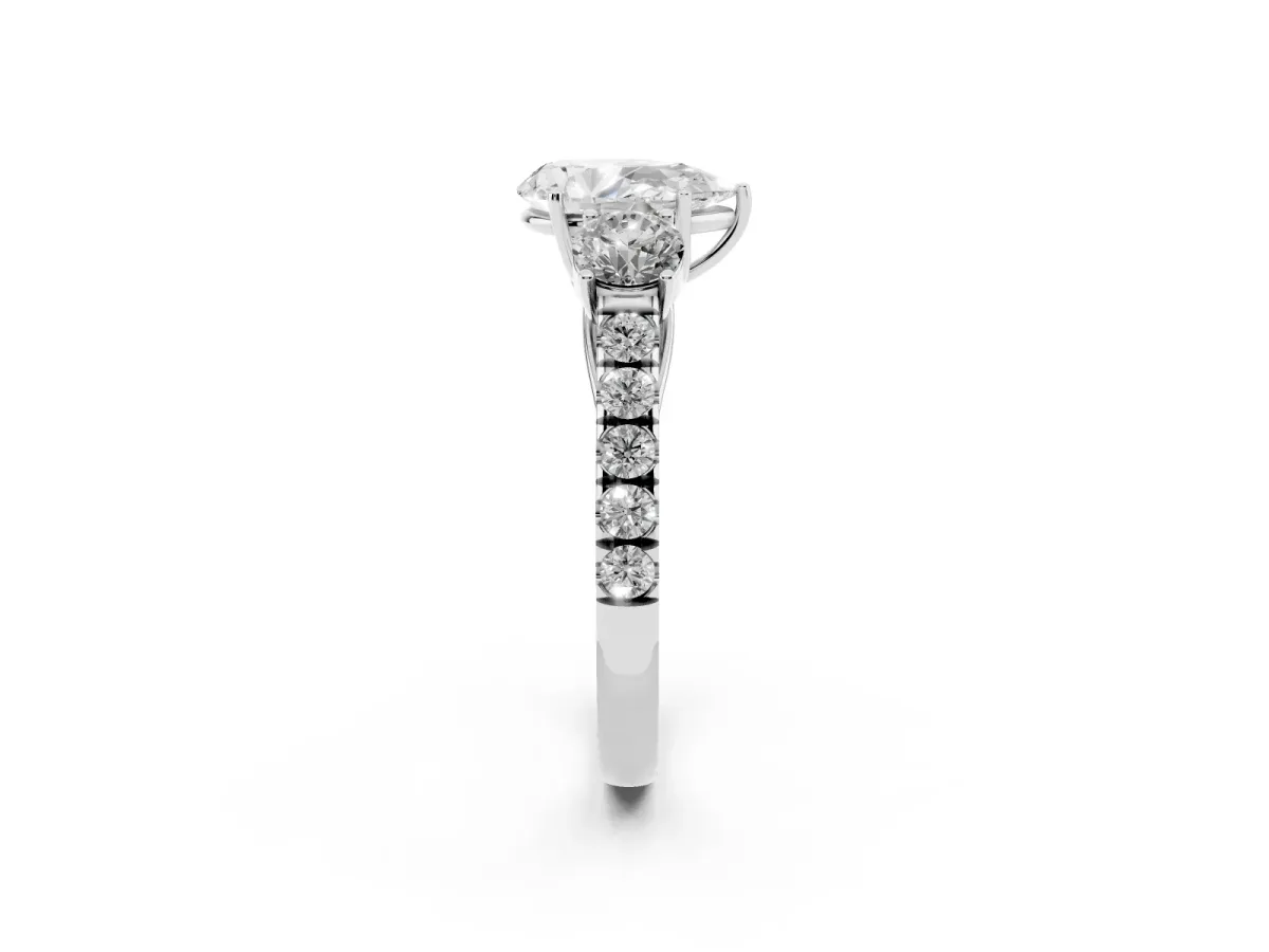 Pear Cut Cut Diamond Three-Stone Ring with Round Side Stones and Pavé Band Silver