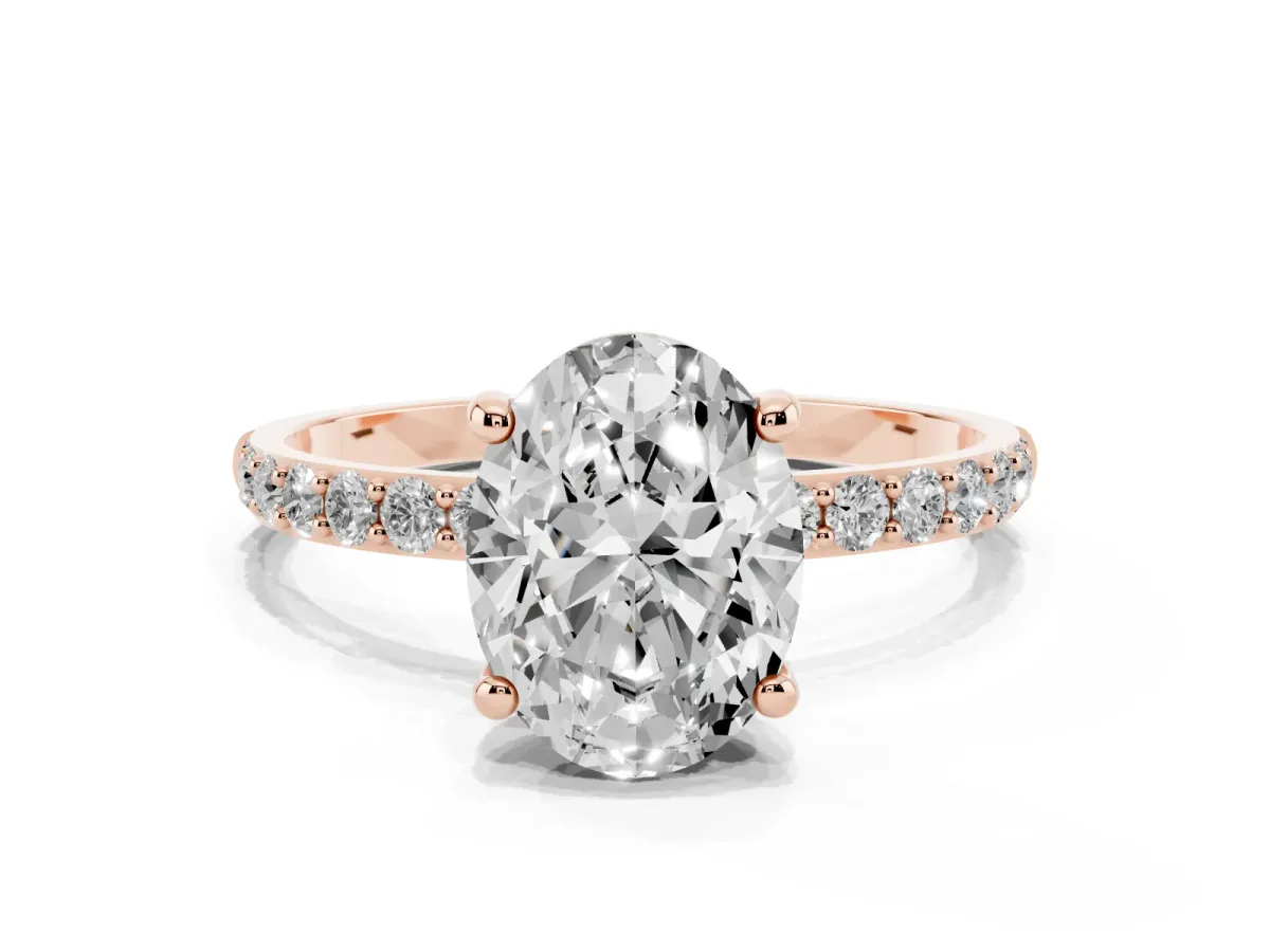 Oval Cut Diamond Solitaire Ring with Round Pavé Band and Prong Setting Rose gold