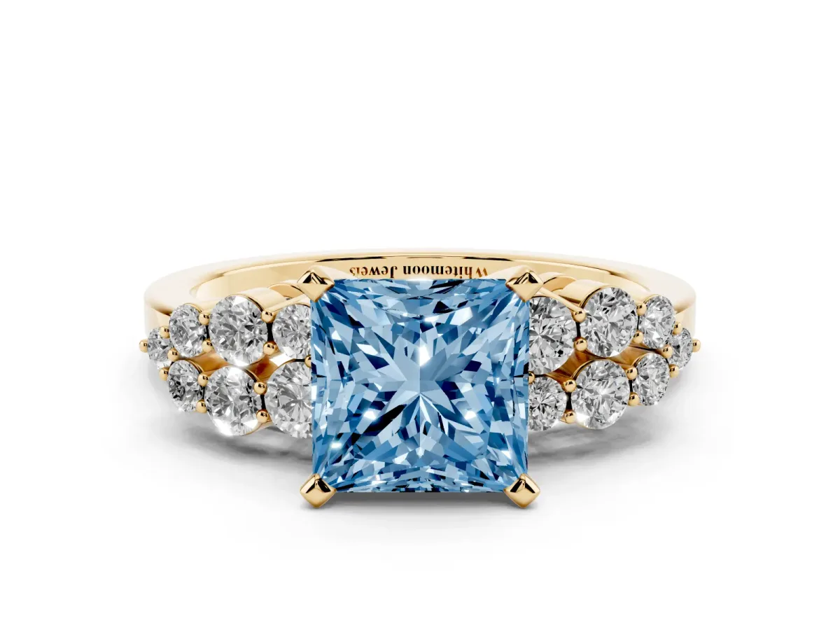 Fancy Blue Princess Cut Cluster Diamond Engagement Ring with Pavé Band and Four-Prong Setting Yellow gold