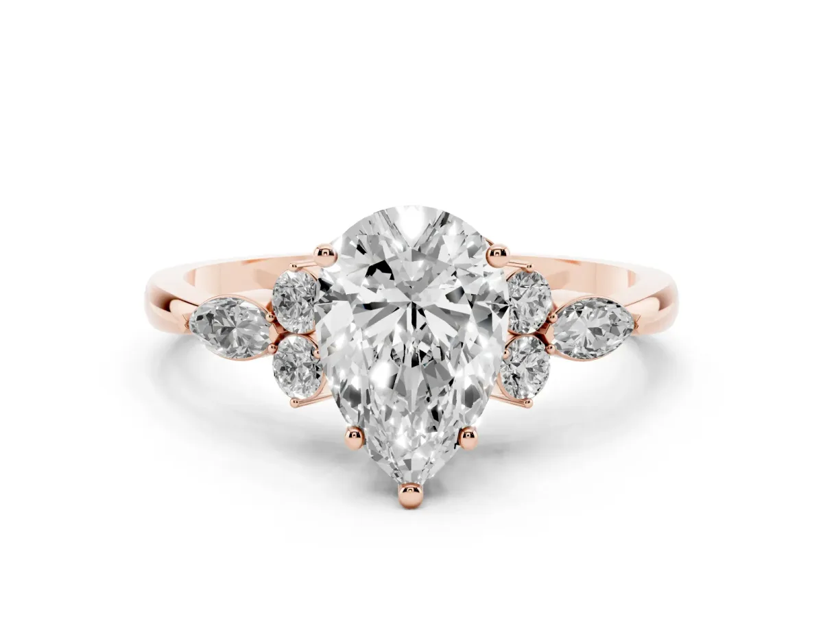 Pear Cut Brilliant Diamond Solitaire Ring with Pear Side Stones and Four-Prong Setting Rose gold