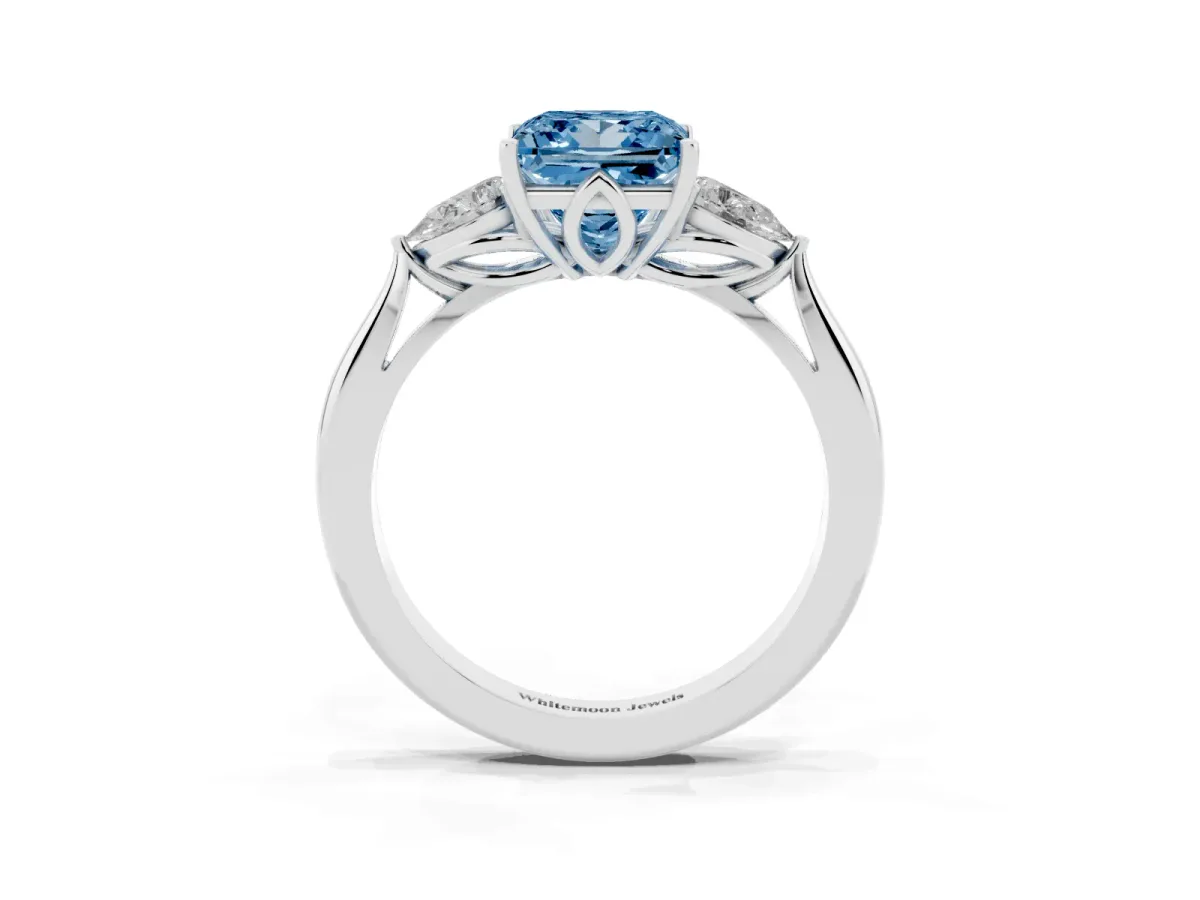 Fancy Blue Three-Stone Princess Cut Brilliant Diamond Solitaire Ring with Tapered Band and Four-Prong Setting White gold