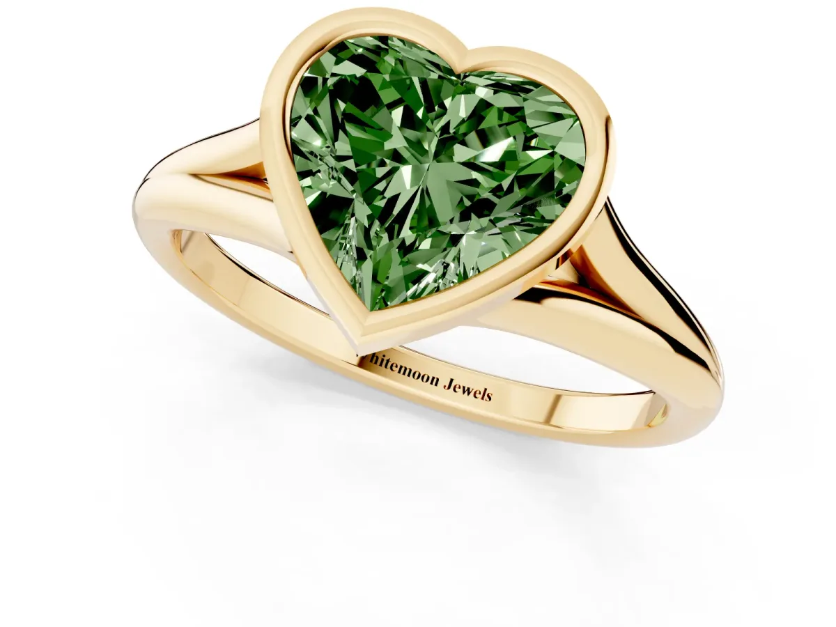Fancy Green Bezel Set Heart Cut Cut Solitaire Ring with Tapered Band Yellow gold