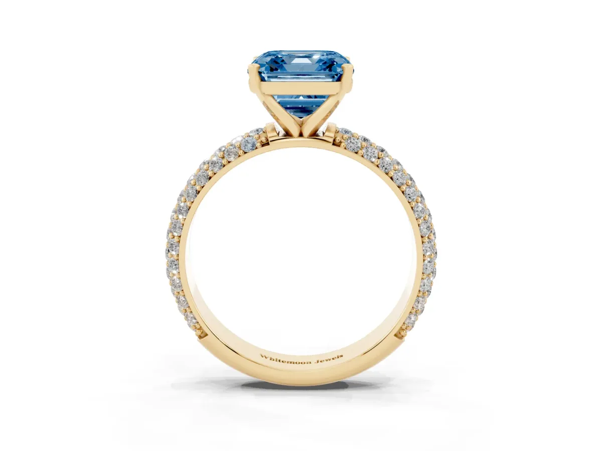 Fancy Blue Asscher Cut Diamond Solitaire Ring with Prong Setting and Pavé Band Yellow gold