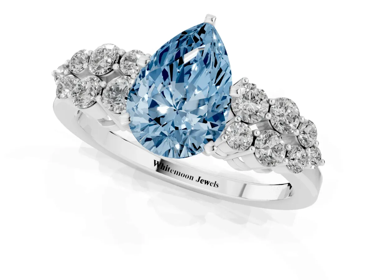 Fancy Blue Pear Cut Cluster Diamond Engagement Ring with Pavé Band and Four-Prong Setting Silver