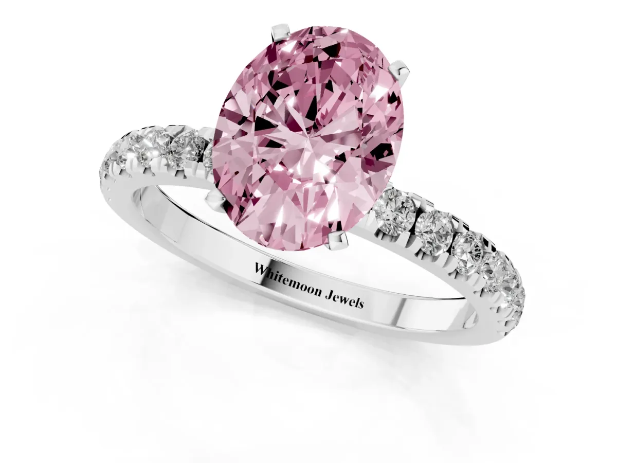 Fancy Pink Oval Cut Diamond Solitaire Ring with Pavé Accents and Four-Prong Setting Platinum