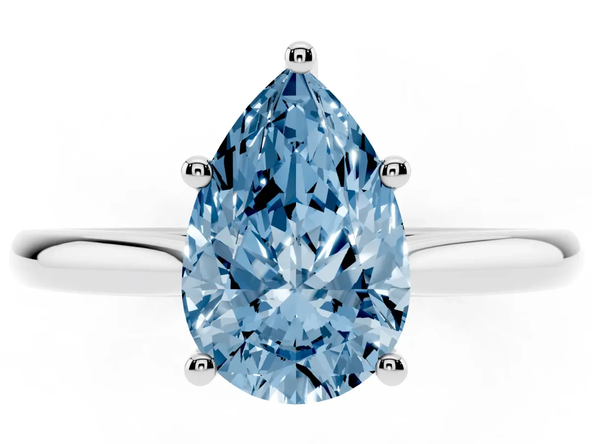 Fancy Blue Pear Cut Cut Solitaire Ring with Cathedral Band and Four-Prong Setting Silver