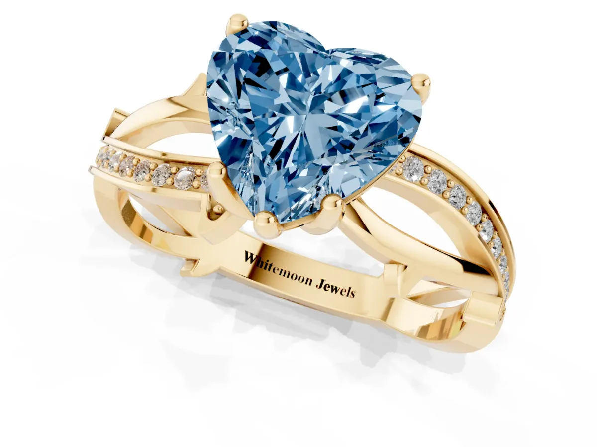 Fancy Blue Heart Cut Solitaire Twist Band with Pavé Accents and Four-Prong Setting Yellow gold
