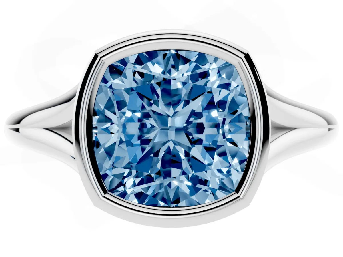 Fancy Blue Bezel Set Cushion Cut Cut Solitaire Ring with Tapered Band Silver