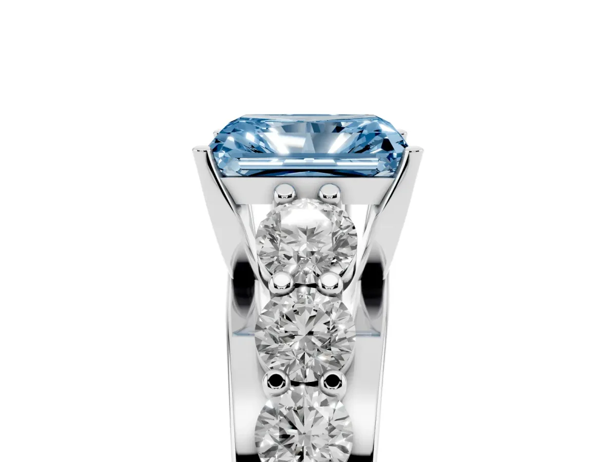 Fancy Blue Radiant Cut Diamond Engagement Ring with Pavé Band and Four-Prong Setting Silver