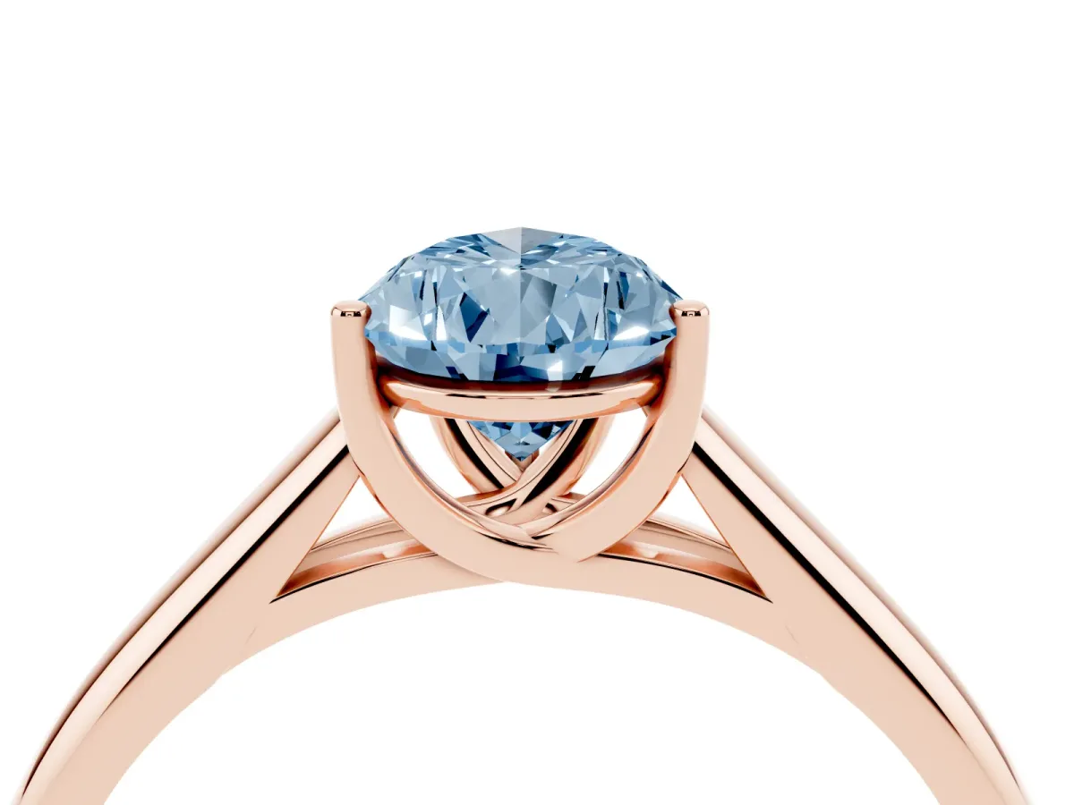 Fancy Blue Pear Cut Solitaire Engagement Ring with Tapered Band and Four-Prong Setting Rose gold
