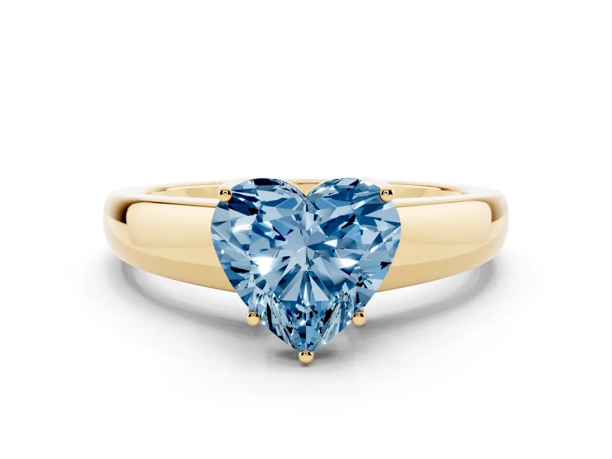 Fancy Blue Heart Cut Solitaire Diamond Ring with Tapered Band and Four-Prong Setting Yellow gold