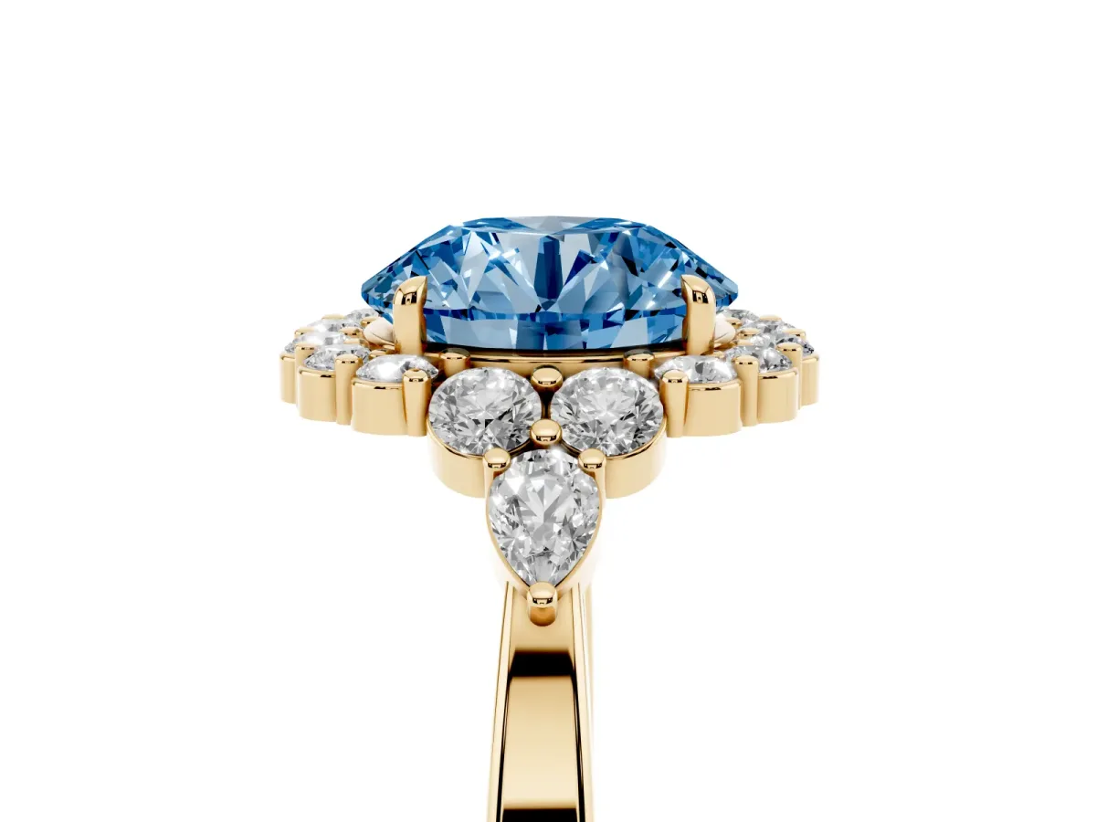 Fancy Blue Round Cut Diamond Halo Ring with Pear Side Stones and Prong Setting Yellow gold