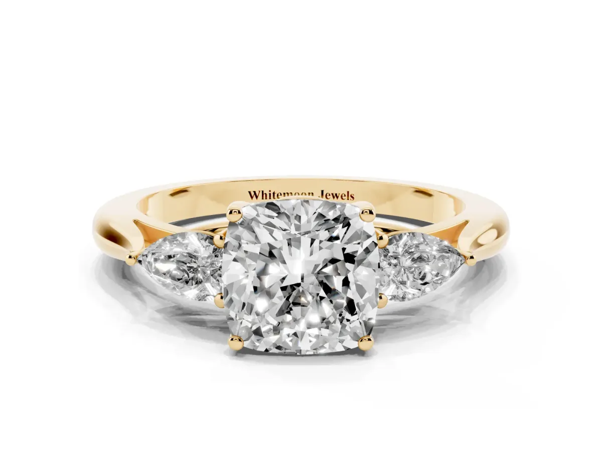 Cushion Cut Diamond Three-Stone Ring with Pear Side Stones and Prong Setting Yellow gold