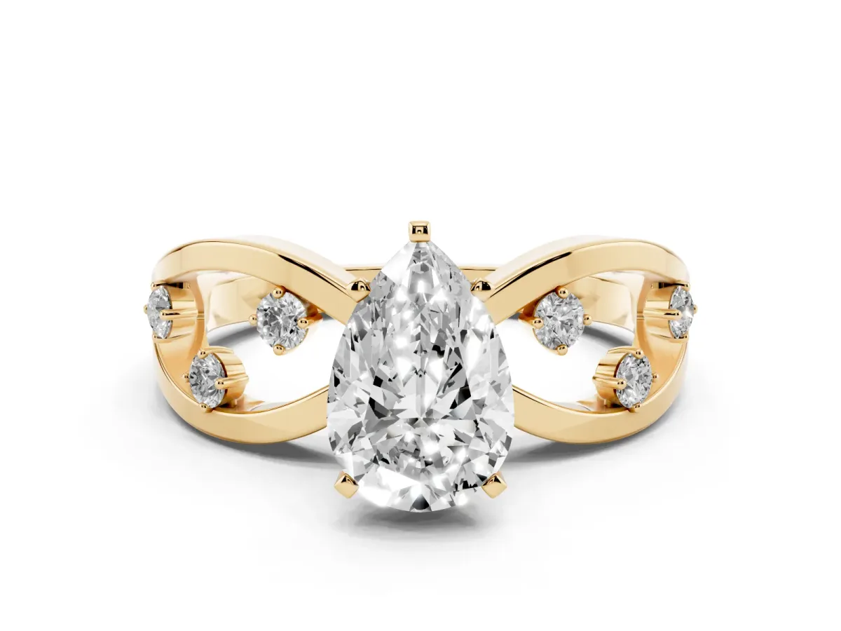Pear Cut Cut Solitaire Diamond with Side Stones on Criss-Cross Band and Four-Prong Setting Yellow gold