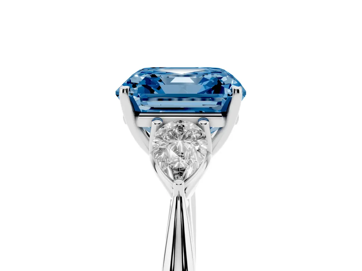 Fancy Blue Three-Stone Asscher Cut Brilliant Diamond Solitaire Ring with Tapered Band and Four-Prong Setting Platinum