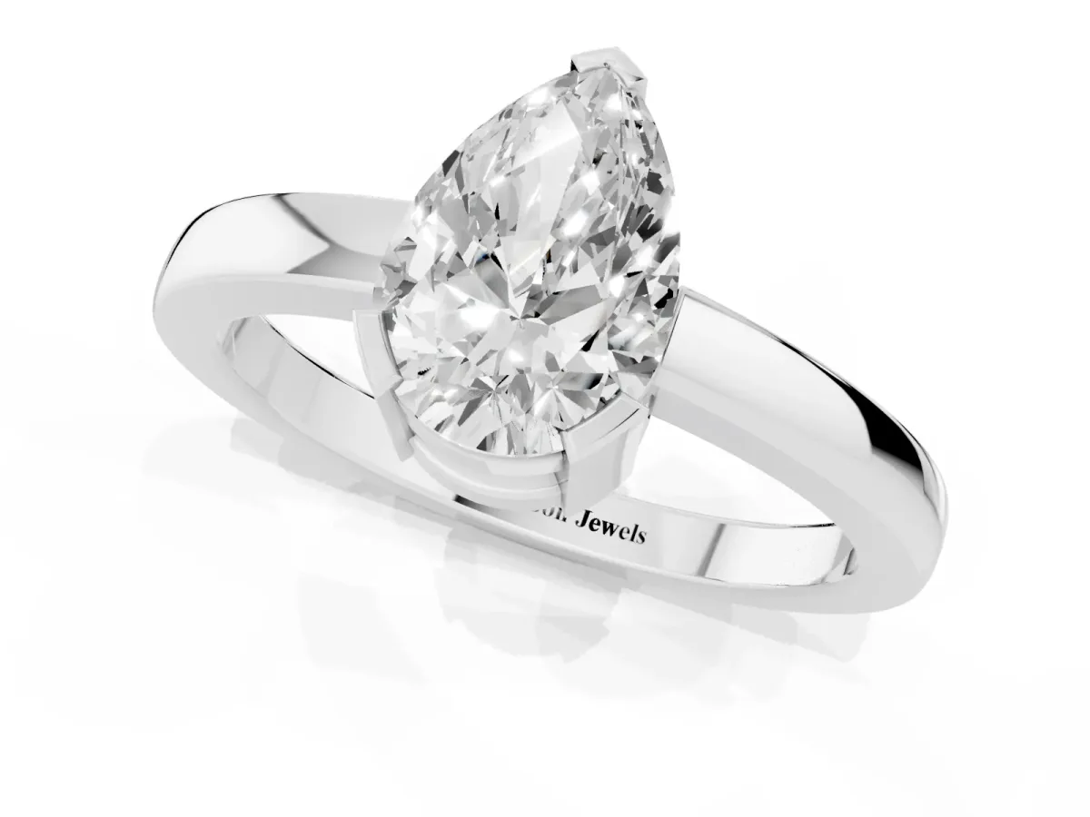 Pear Cut Cut Solitaire Ring with Four-Prong Setting and Classic Band Platinum