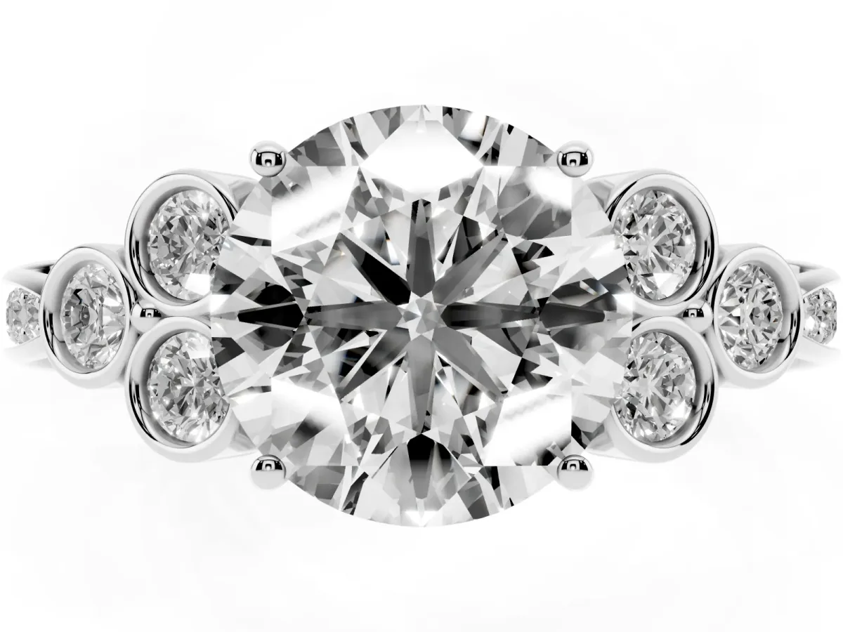 Round Cut Cut Diamond Engagement Ring with Bezel Set Round Side Stones and Prong Setting White gold