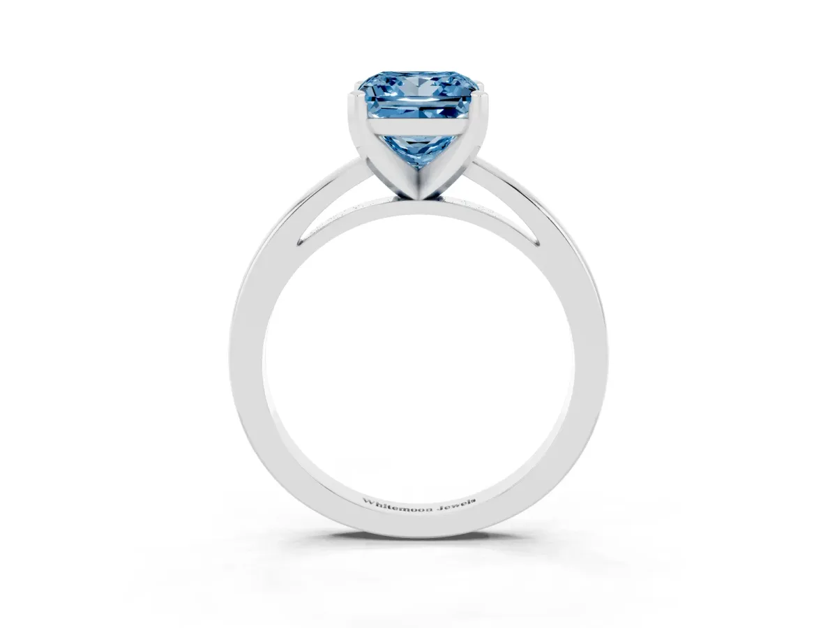 Fancy Blue Princess Cut Solitaire Diamond Engagement Ring with Four-Prong Setting on a Classic Band Silver