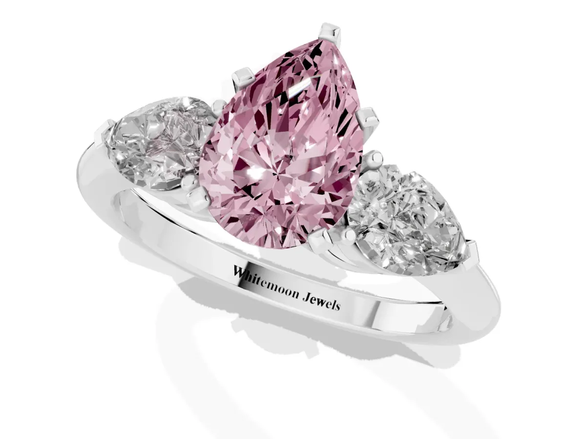 Fancy Pink Three-Stone Pear Cut Diamond Ring with Pear Side Stones and Four-Prong Setting Silver
