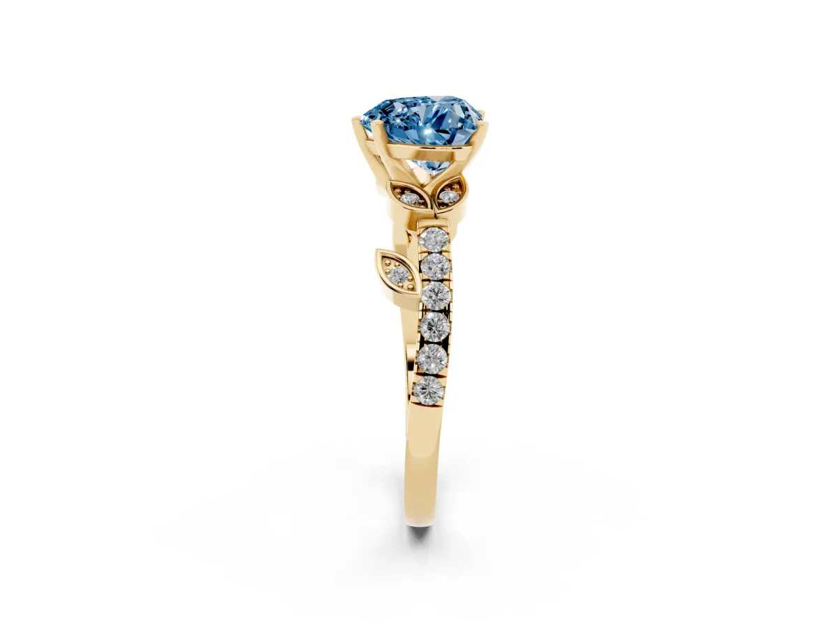 Fancy Blue Heart Cut Solitaire Leaf-Inspired Diamond Ring with Pavé Band and Four-Prong Setting Yellow gold