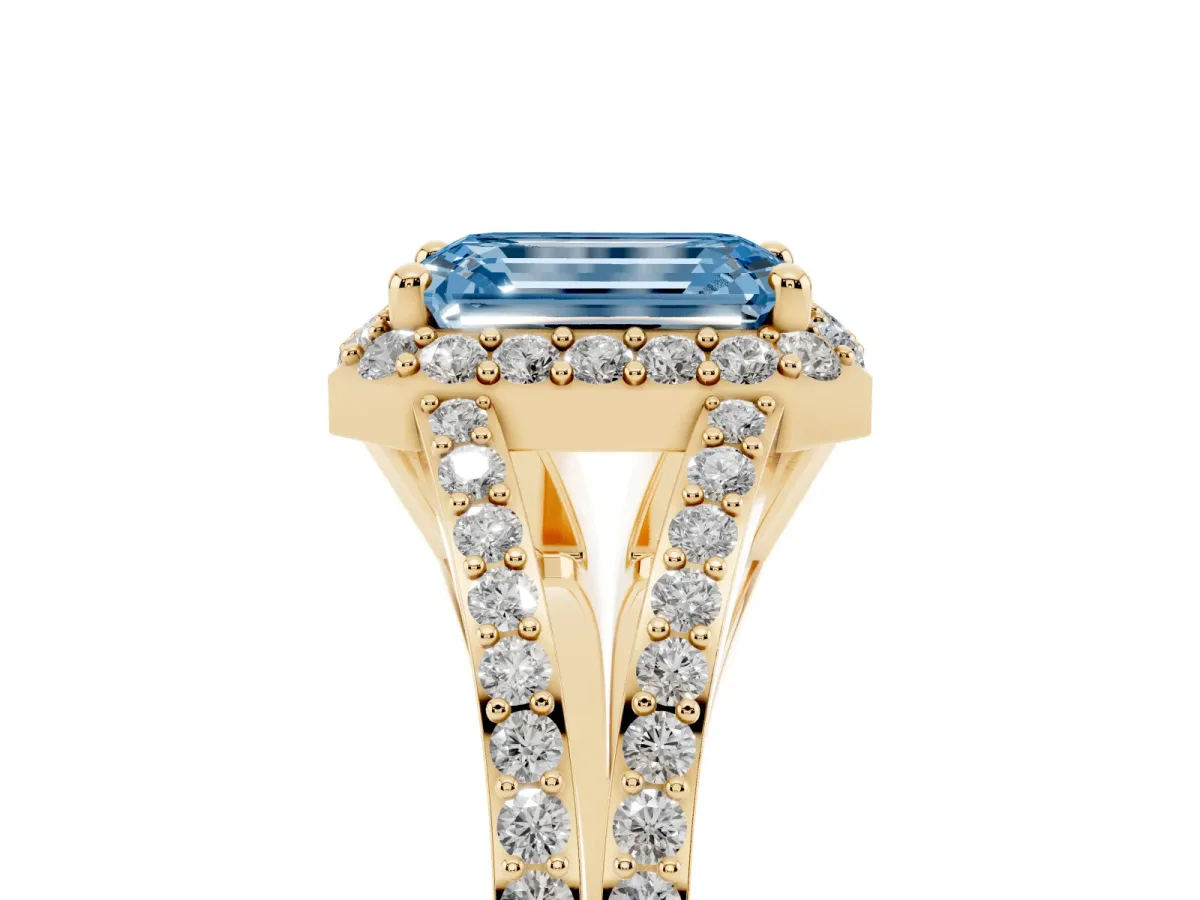 Fancy Blue Emerald Cut Halo Split Shank Diamond Ring with Prong Setting Yellow gold