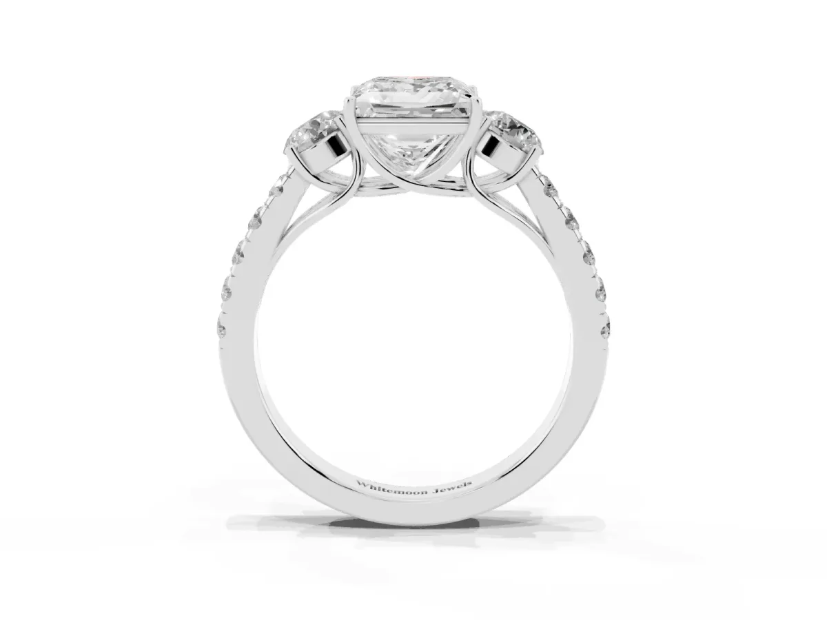 Princess Cut Cut Diamond Three-Stone Ring with Round Side Stones and Pavé Band Platinum