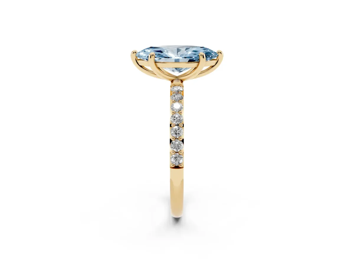 Fancy Blue Marquise Cut Diamond Solitaire Ring with Round Pavé Band and Prong Setting Yellow gold