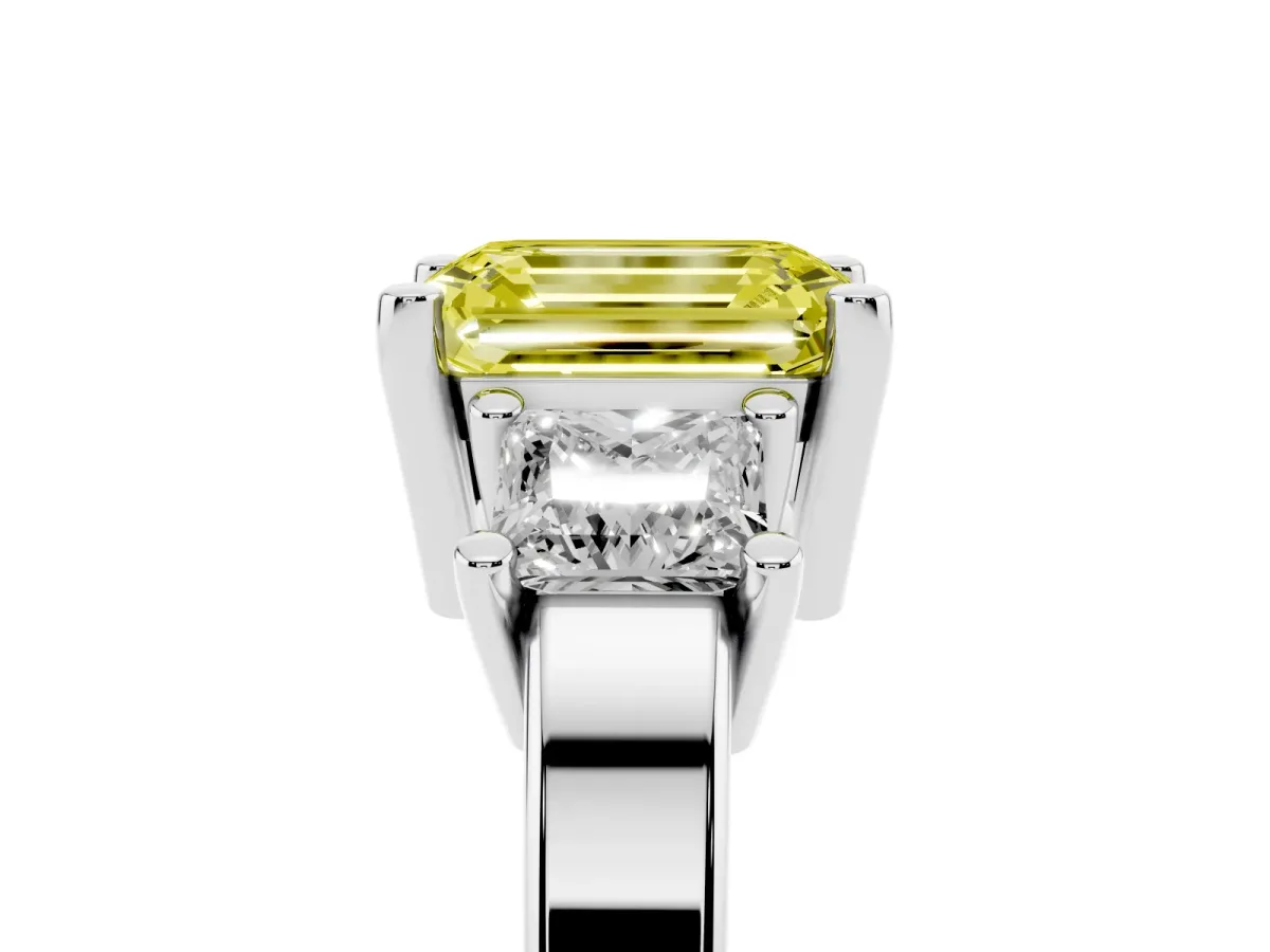 Fancy Yellow Three-Stone Emerald Cut Cut Solitaire Ring with Prong Setting Platinum
