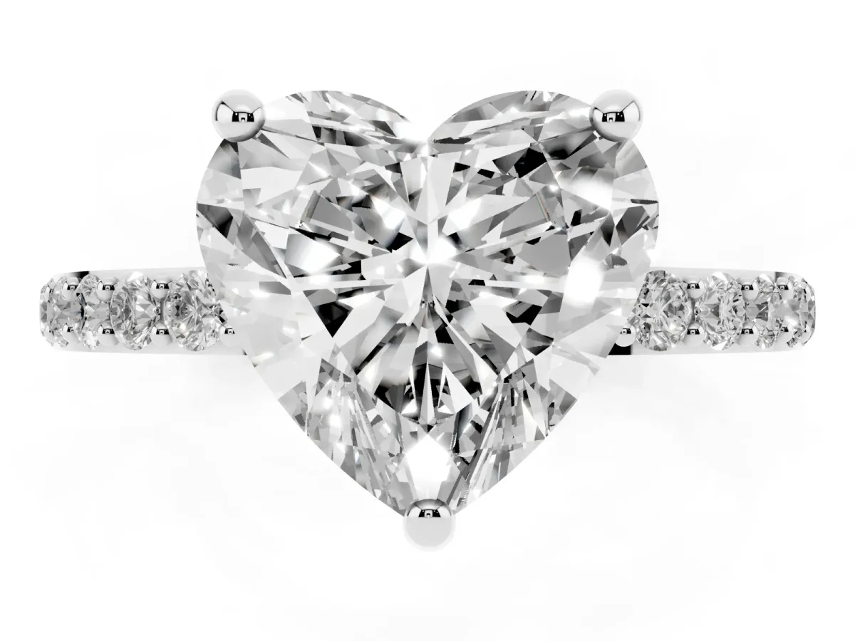 Heart Cut Diamond Solitaire Ring with Round Pavé Band and Prong Setting Silver