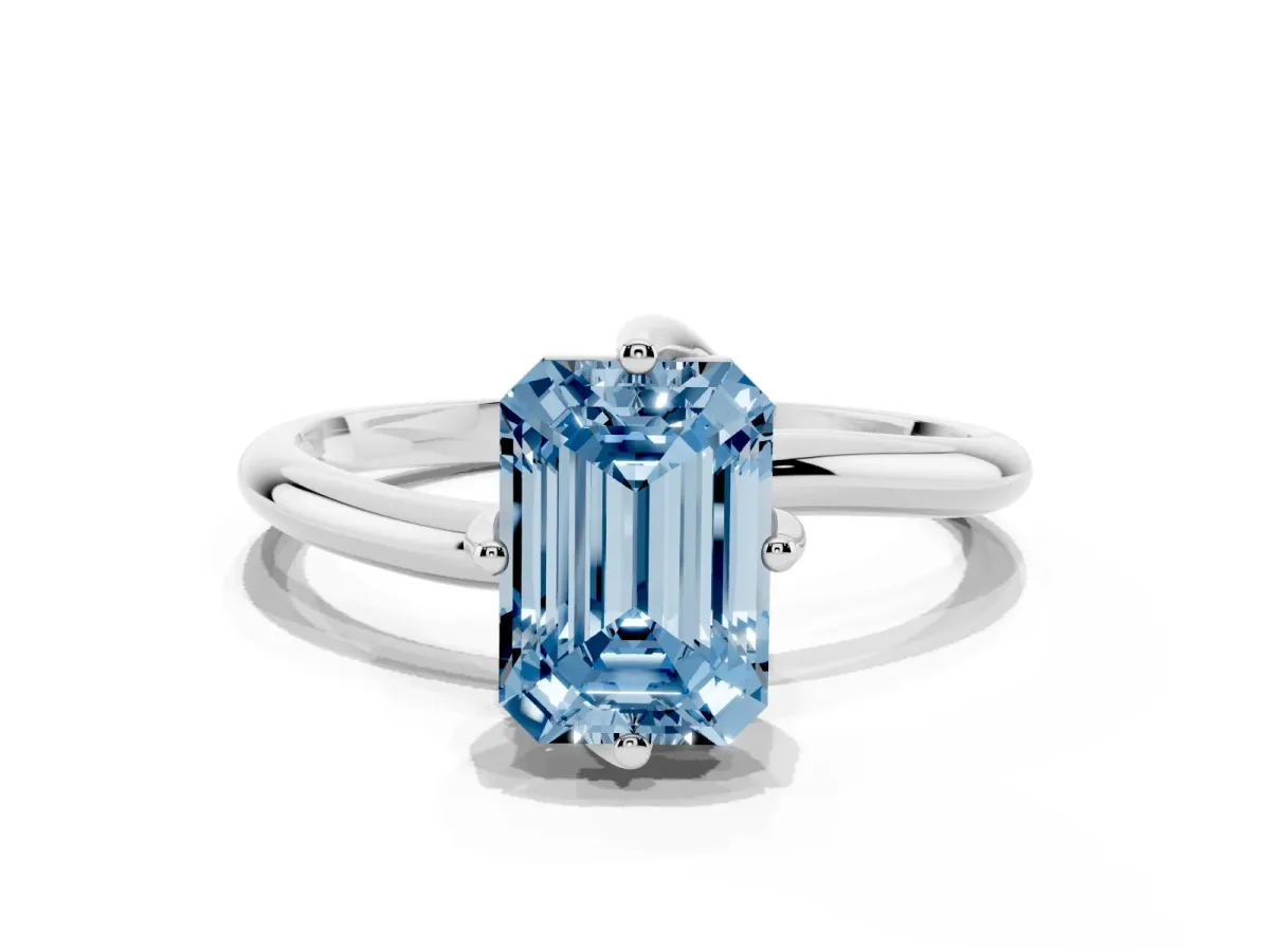 Fancy Blue Emerald Cut Diamond Solitaire Engagement Ring with Four-Prong Setting and Classic Band Silver