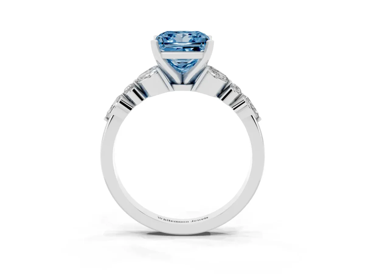 Fancy Blue Princess Cut Diamond Solitaire Ring with Side Stones and Four-Prong Setting Platinum