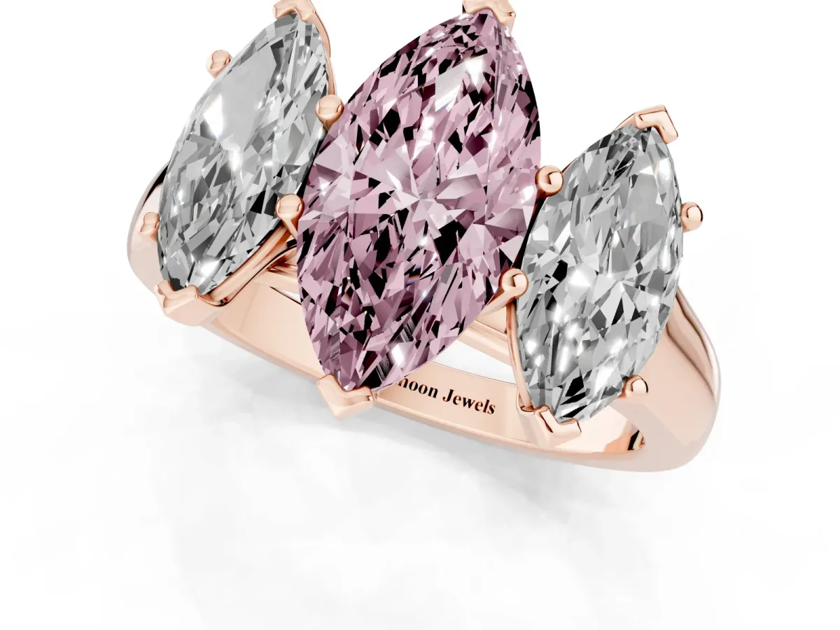 Fancy Pink Marquise Cut Three-Stone Diamond Ring with Prong Setting on a Classic Band Rose gold