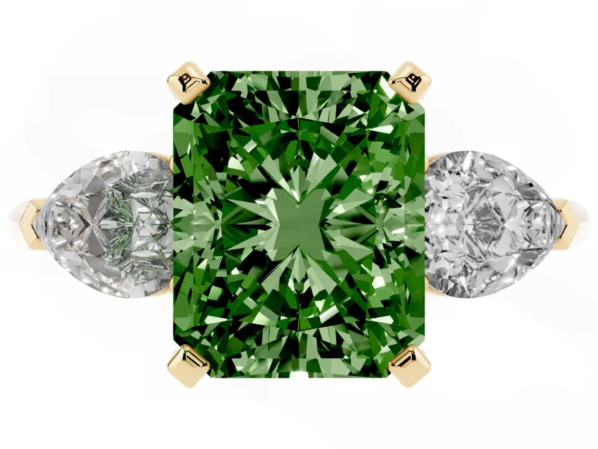 Fancy Green Three-Stone Radiant Cut Diamond Ring with Pear Side Stones and Four-Prong Setting Yellow gold
