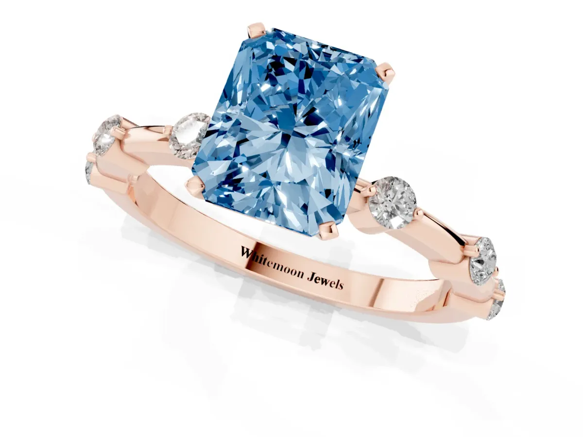 Fancy Blue Radiant Cut Solitaire Diamond Ring with Bezel Set Side Stones and Prong Setting Rose gold