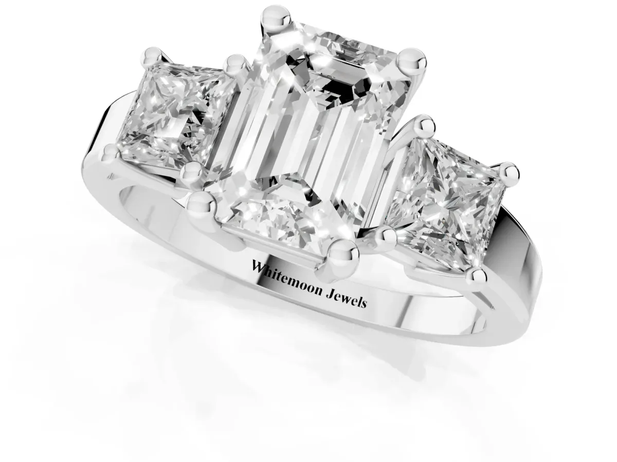 Three-Stone Emerald Cut Cut Solitaire Ring with Prong Setting Platinum