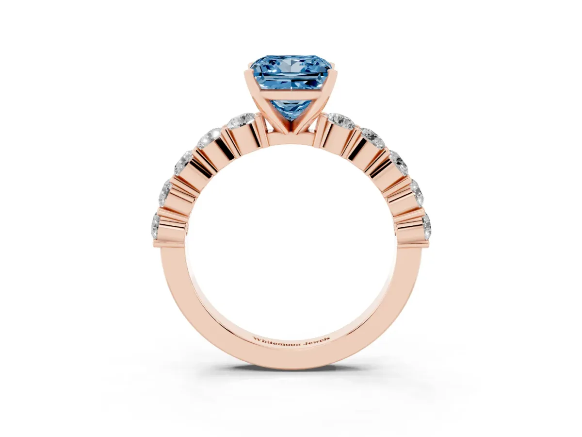 Fancy Blue Princess Cut Diamond Solitaire Ring with Shared Prong Round Side Stones Rose gold