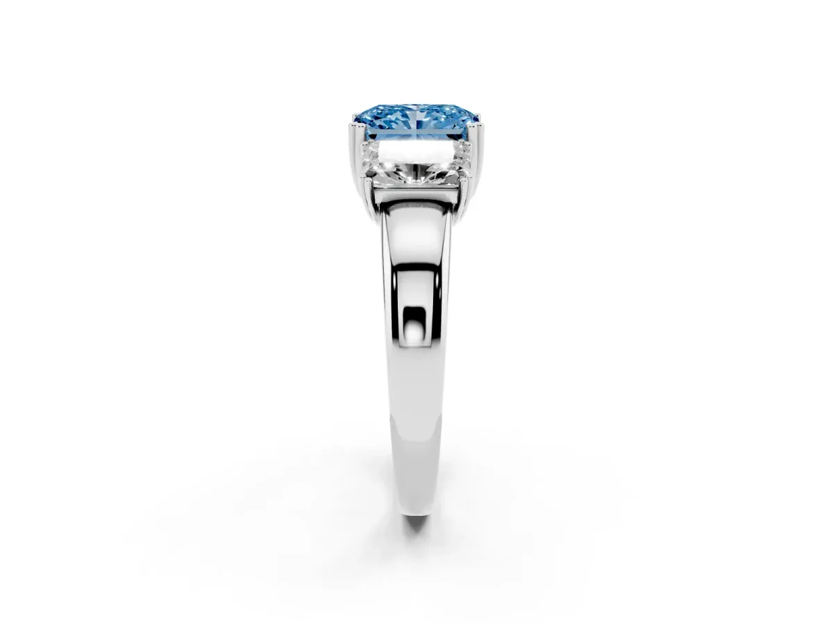 Fancy Blue Three-Stone Radiant Cut Cut Diamond Ring with Channel Set Band and Four-Prong Setting Silver