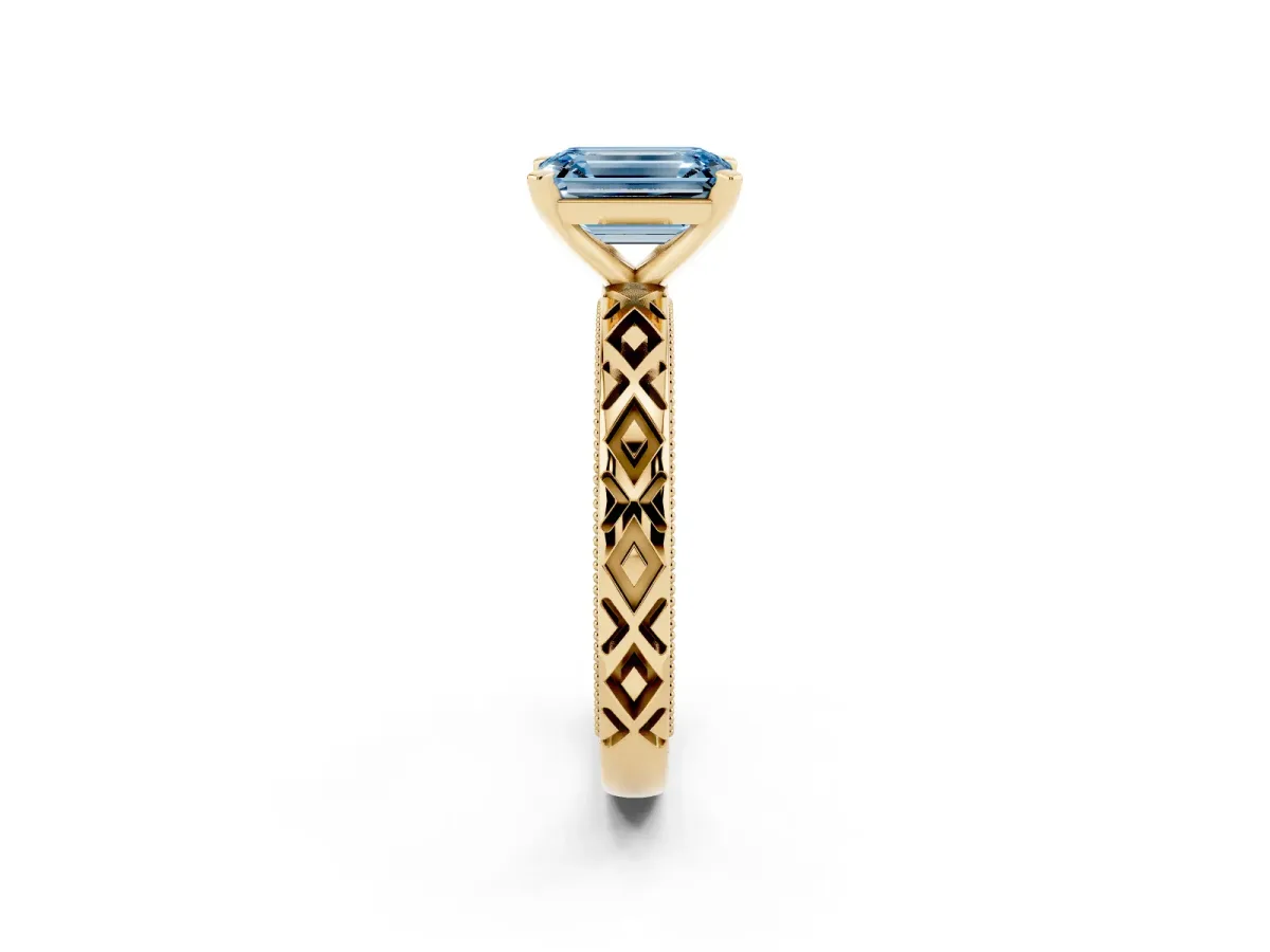 Fancy Blue Emerald Cut Solitaire Diamond Ring with Milgrain and Black Enamel X Pattern Band Yellow gold