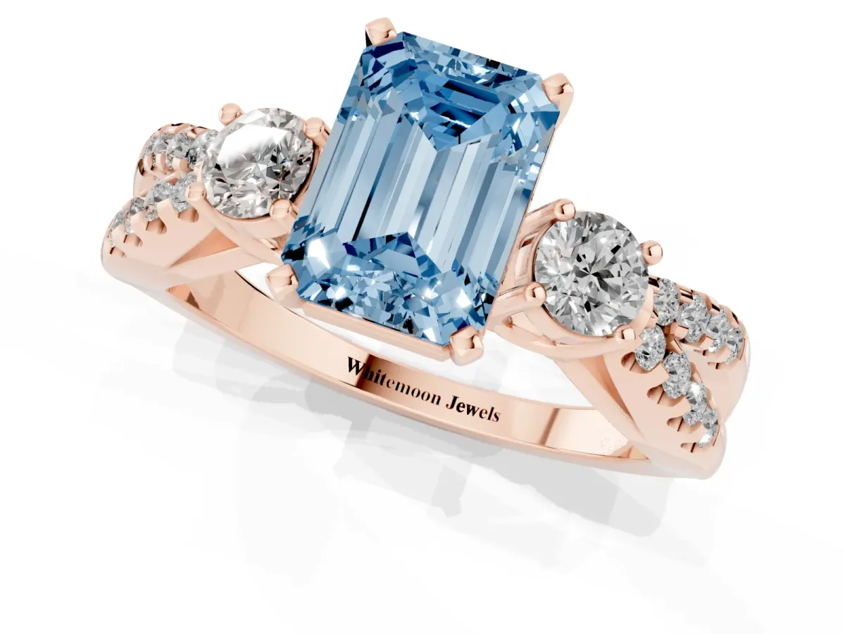 Fancy Blue Emerald Cut Diamond Three-Stone Ring with Pavé Split Shank and Four-Prong Setting Rose gold