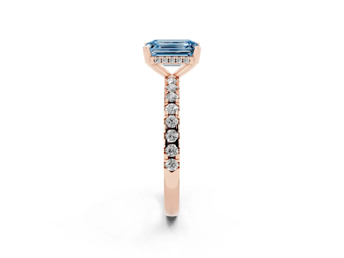 Fancy Blue Emerald Cut Diamond Solitaire Ring with Round Pavé Band and Four-Prong Setting Rose gold