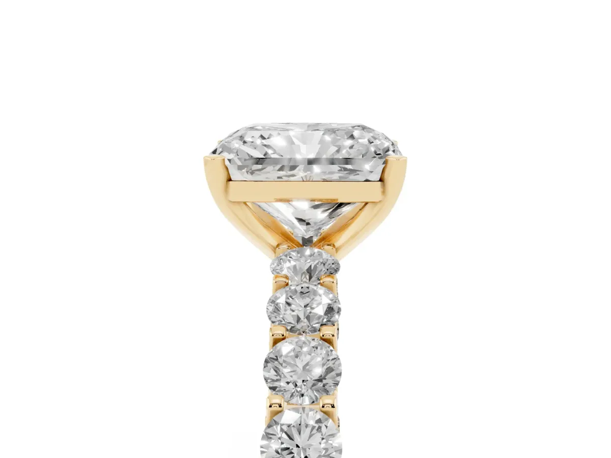 Radiant Cut Diamond Solitaire Ring with Shared Prong Pavé Band and Four-Prong Setting Yellow gold