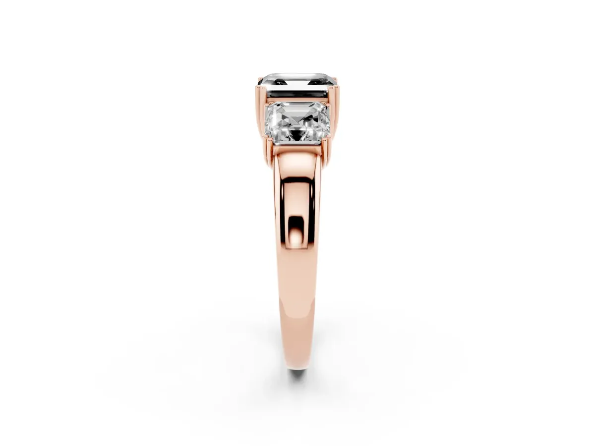 Fancy Black Three-Stone Asscher Cut Cut Diamond Ring with Channel Set Band and Four-Prong Setting Rose gold