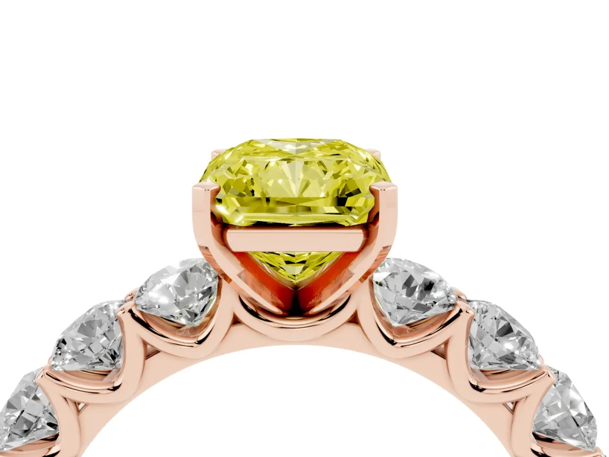 Fancy Yellow Radiant Cut Diamond Prong Setting with Side Stones on a Pave Band Rose gold