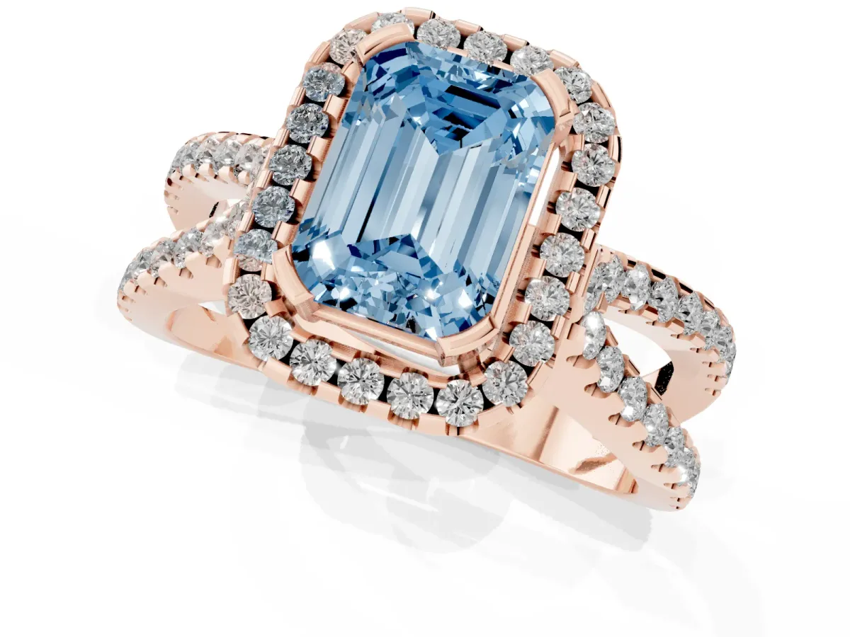 Fancy Blue Emerald Cut Diamond Halo Ring with Split Shank Pavé Band and Prong Setting Rose gold