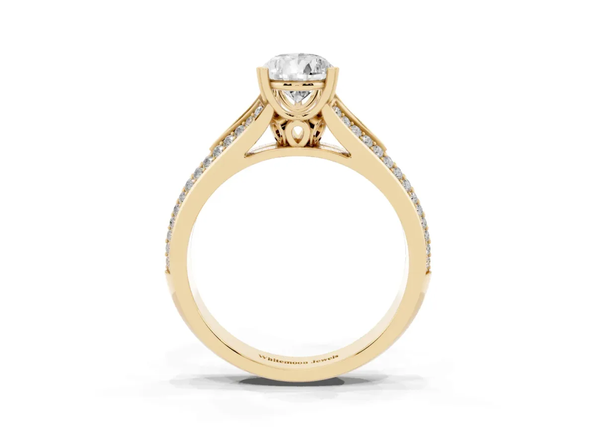 Pear Cut Diamond Split Shank Engagement Ring with Pavé Band Yellow gold