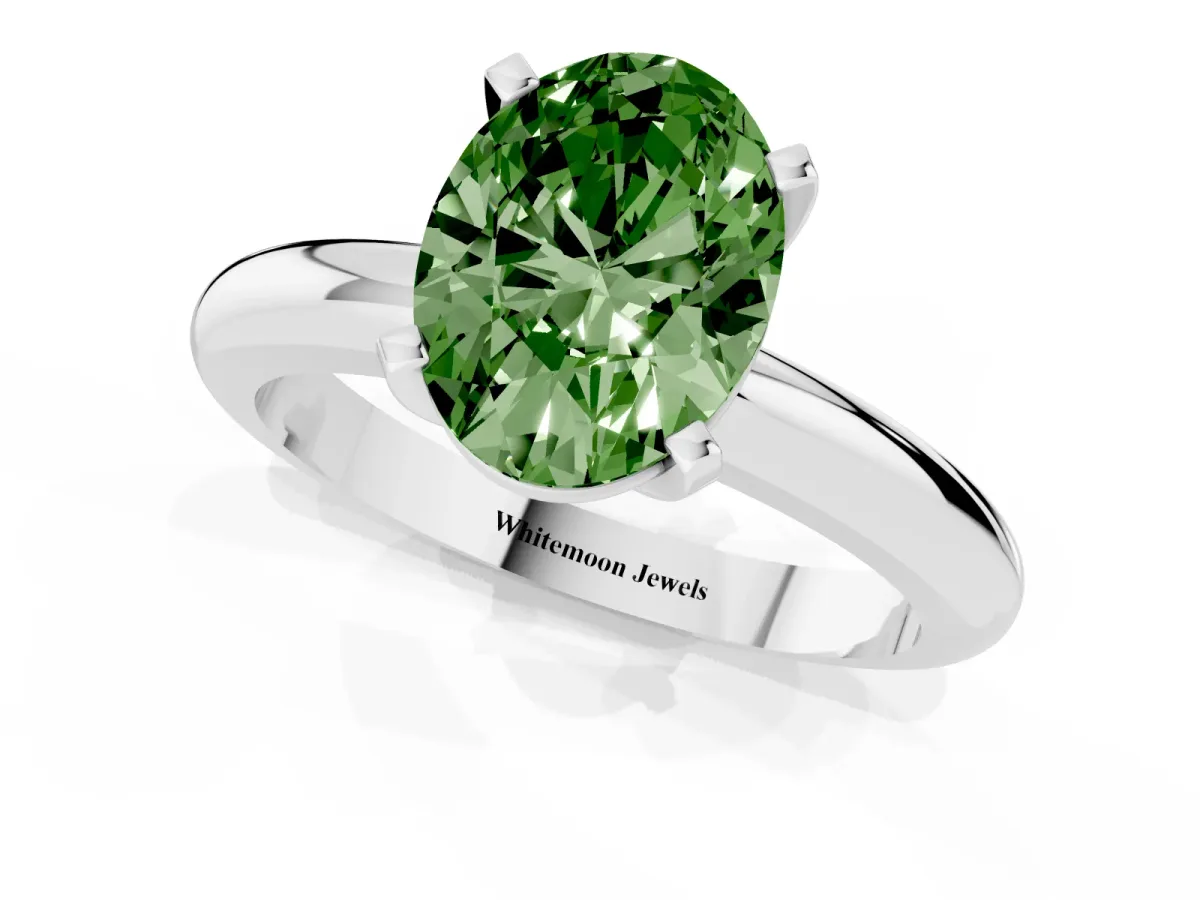 Fancy Green Oval Cut Diamond Solitaire Engagement Ring with Round Band and Four-Prong Setting Silver